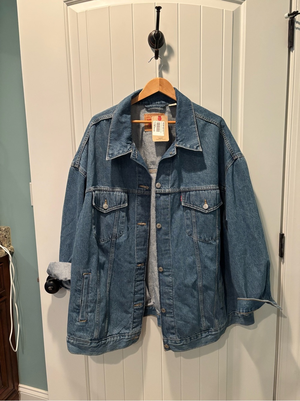 Levi's light blue denim jacket with tan leather label